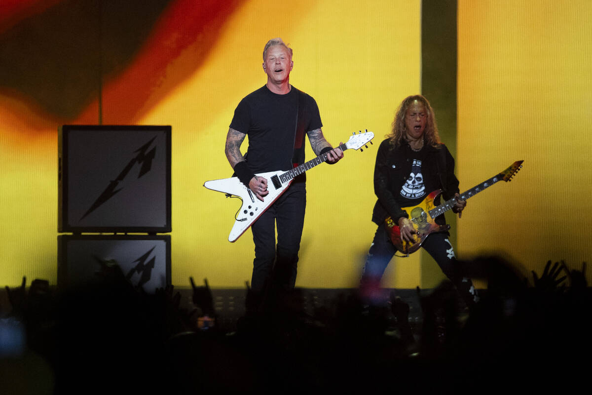James Hetfield, left, and Kirk Hammett of Metallica perform in a music concert at Allegiant Sta ...