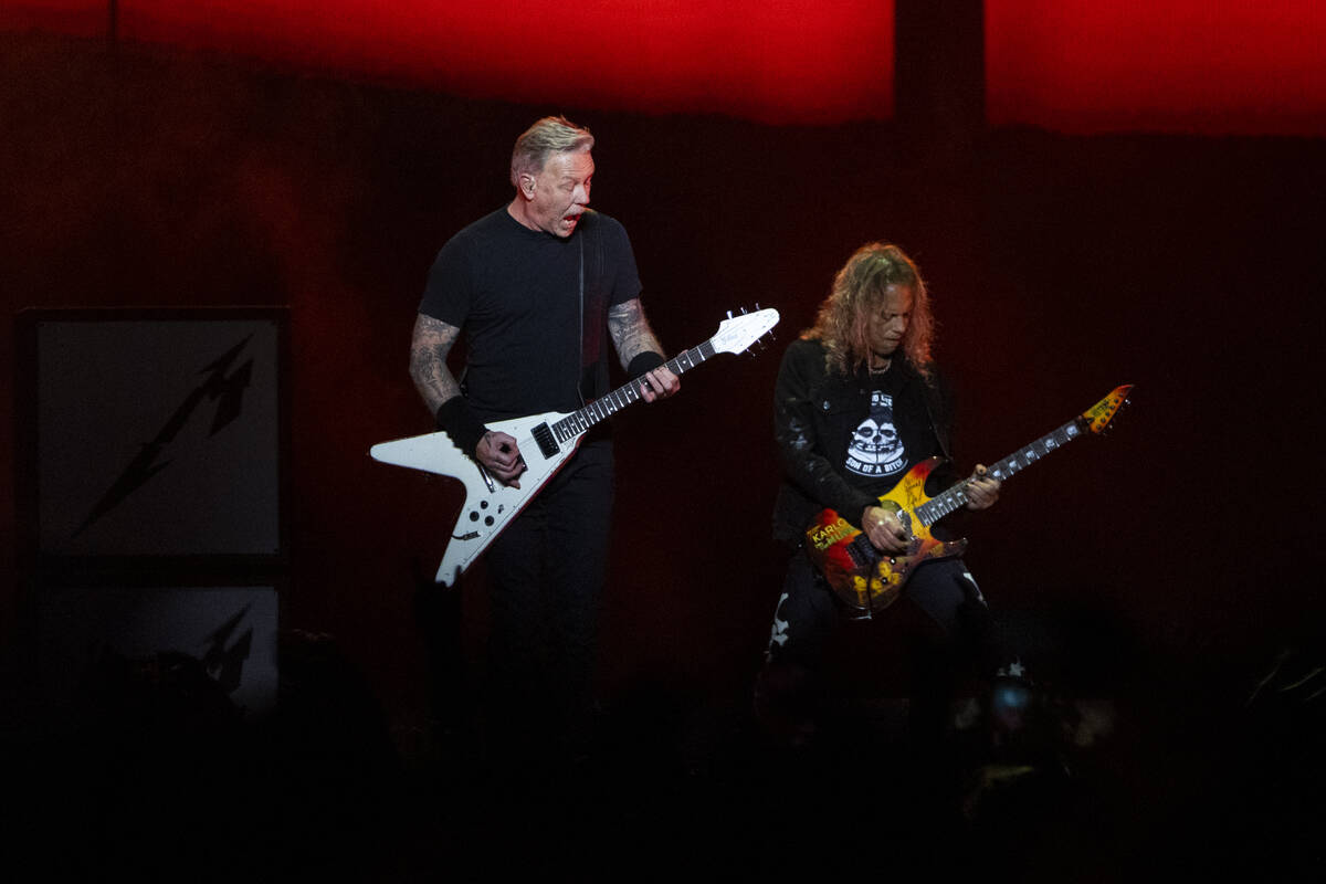 James Hetfield, left, and Kirk Hammett of Metallica perform in a music concert at Allegiant Sta ...