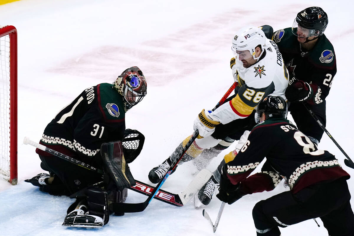 Arizona Coyotes goaltender Scott Wedgewood (31) makes a save on a shot by Vegas Golden Knights ...