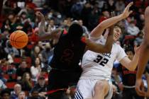 Las Vegas High School's Tavi Jackson (2) and Spring Valley High School's Carson Dooley (32) bat ...