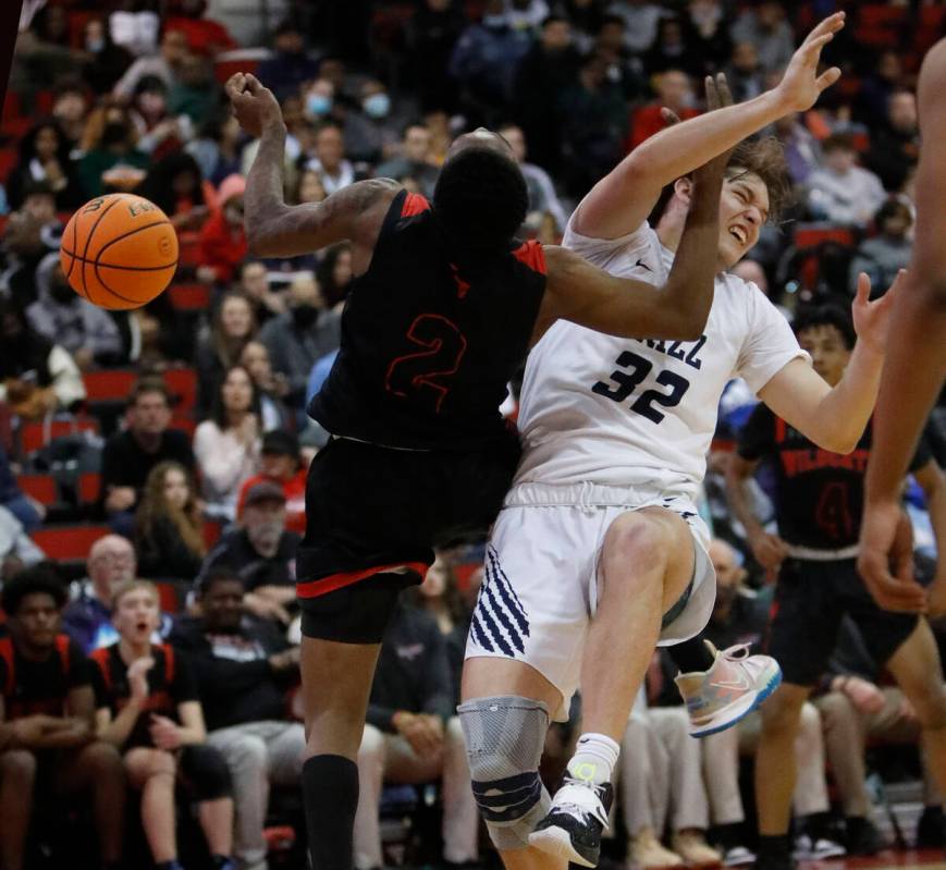 Las Vegas High School's Tavi Jackson (2) and Spring Valley High School's Carson Dooley (32) bat ...