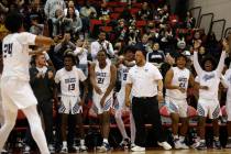 Spring Valley High School players celebrate their victory against Las Vegas High School after t ...