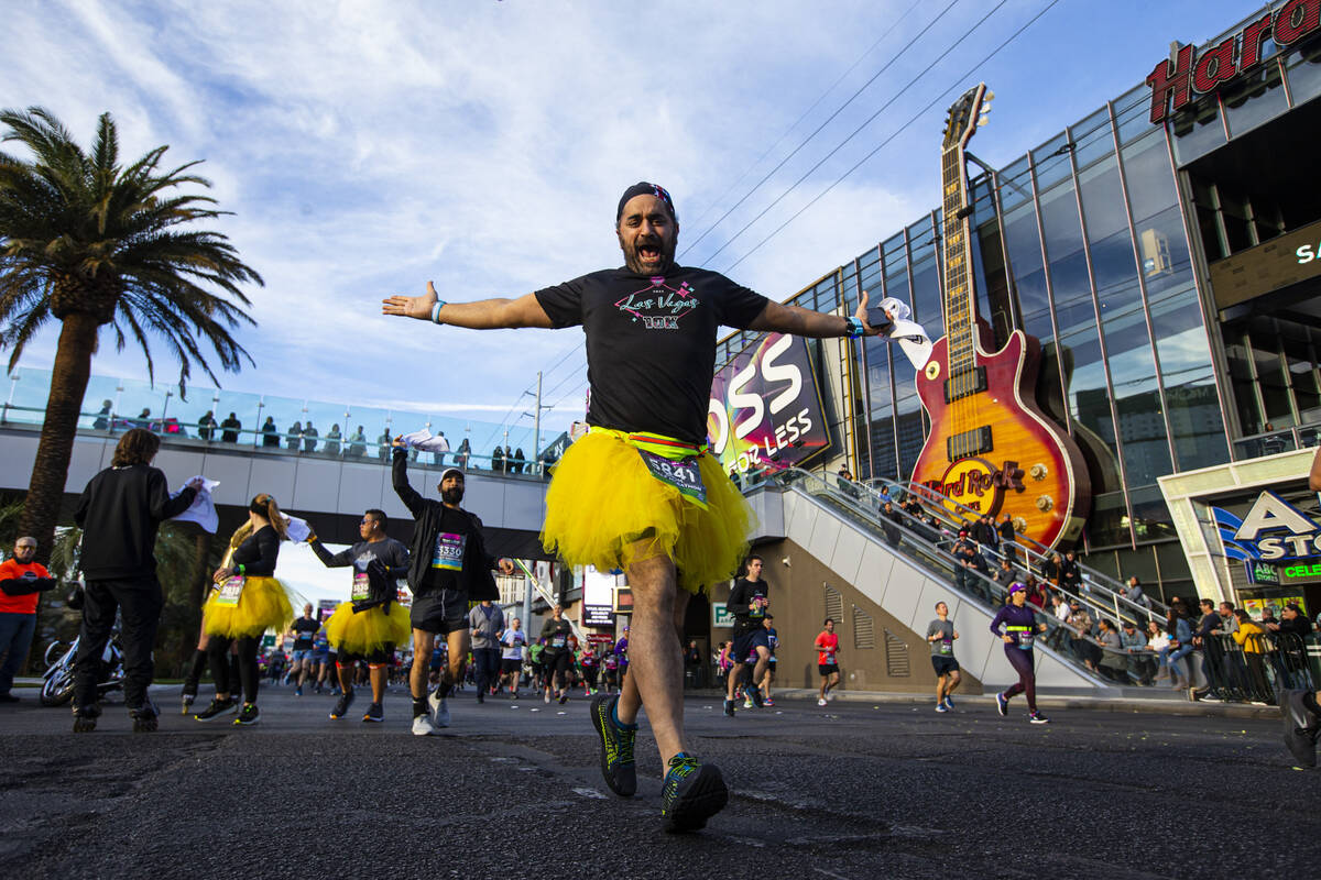 Participants compete during the Rock ‘n’ Roll Las Vegas half marathon and 10-kilo ...