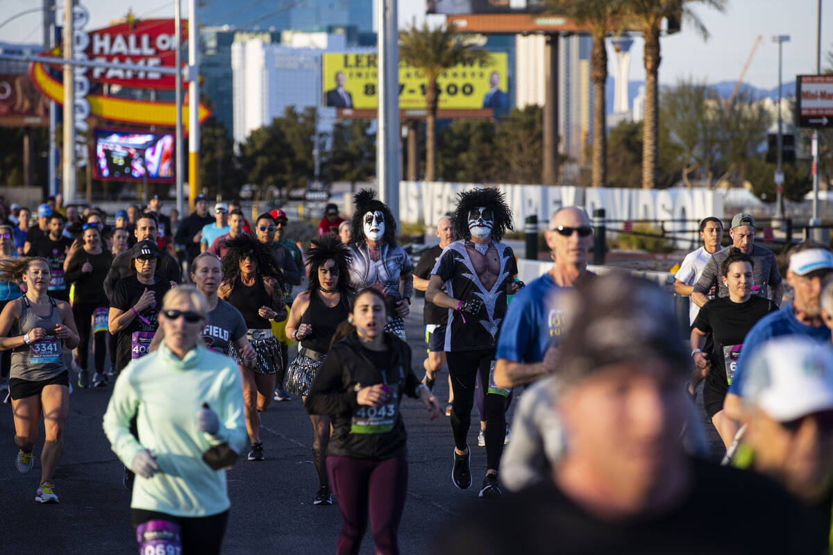 Participants compete during the Rock ‘n’ Roll Las Vegas half marathon and 10-kilo ...