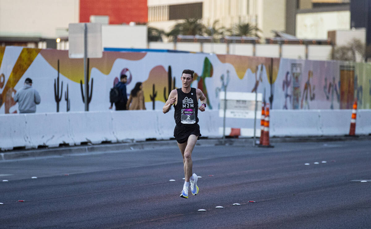 Justin Kent, of Canada, runs the final mile on his way to win the Rock ‘n’ Roll L ...