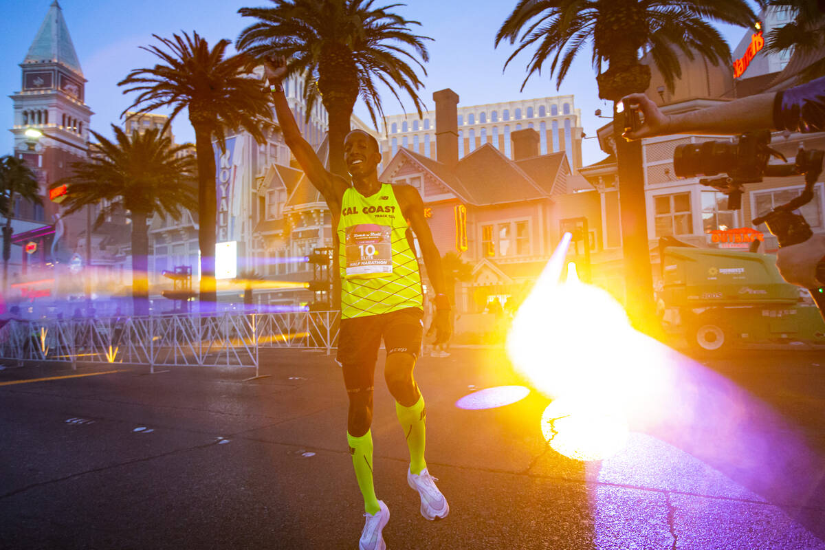 Roosevelt Cook, of Hesperia, Calif., celebrates after finishing in the Rock ‘n’ R ...