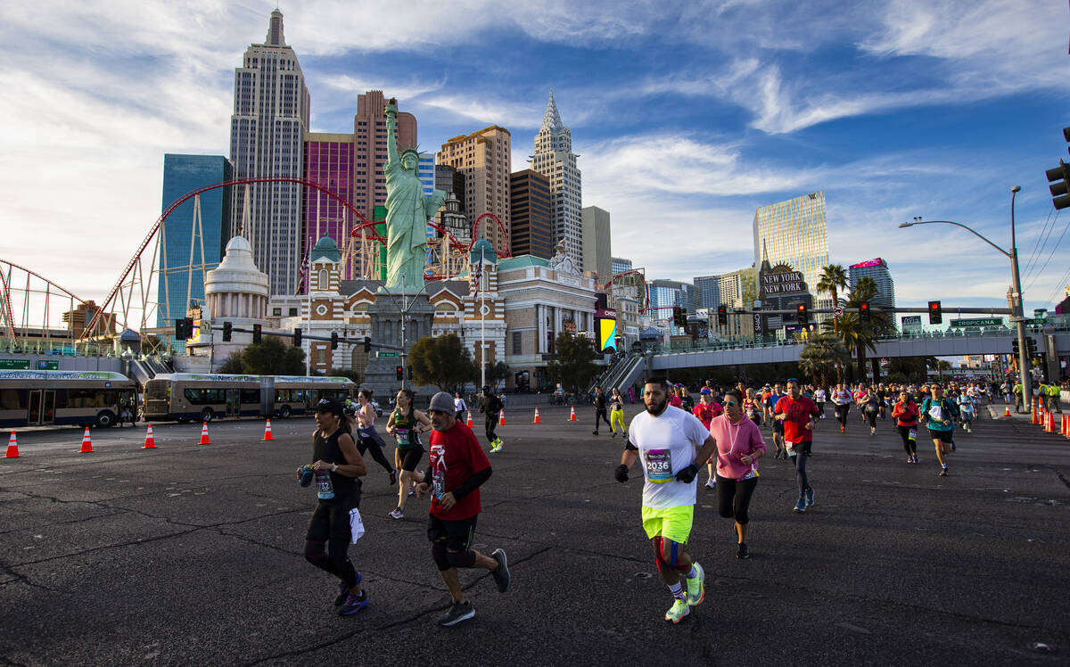 Participants compete during the Rock ‘n’ Roll Las Vegas half marathon and 10-kilo ...