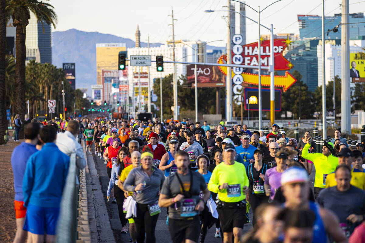 Participants compete during the Rock ‘n’ Roll Las Vegas half marathon and 10-kilo ...