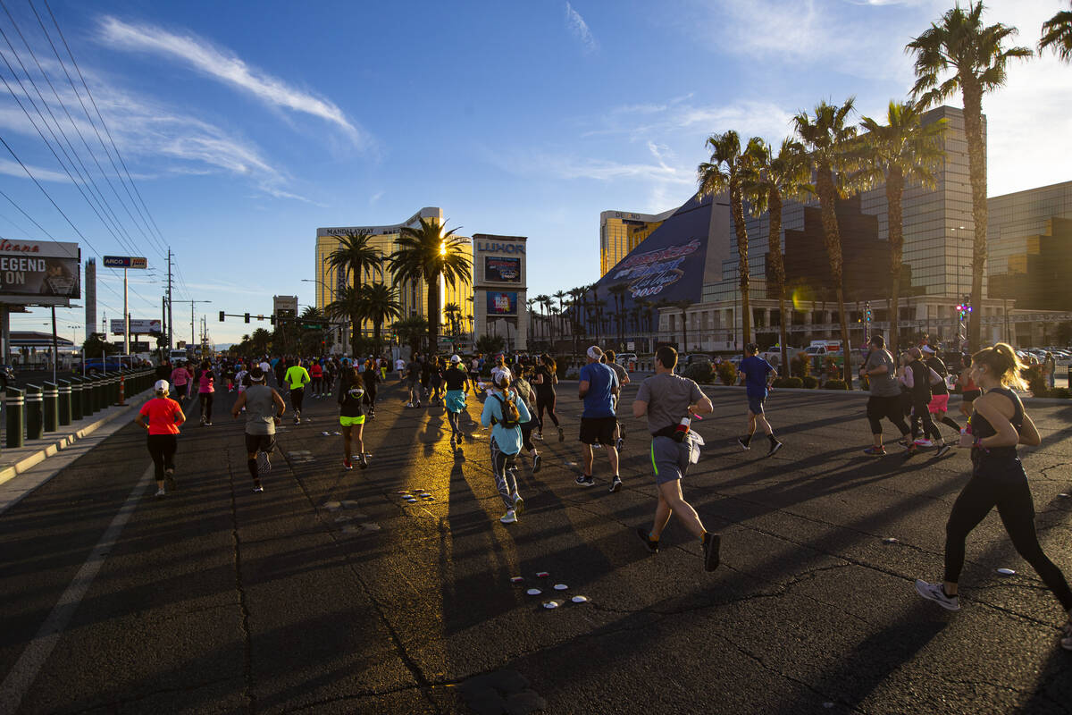 Participants compete during the Rock ‘n’ Roll Las Vegas half marathon and 10-kilo ...