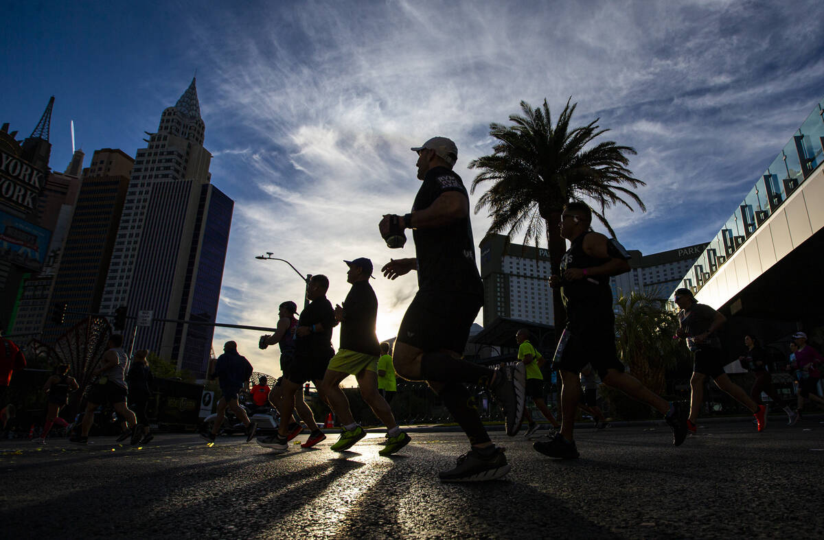 Participants compete during the Rock ‘n’ Roll Las Vegas half marathon and 10-kilo ...