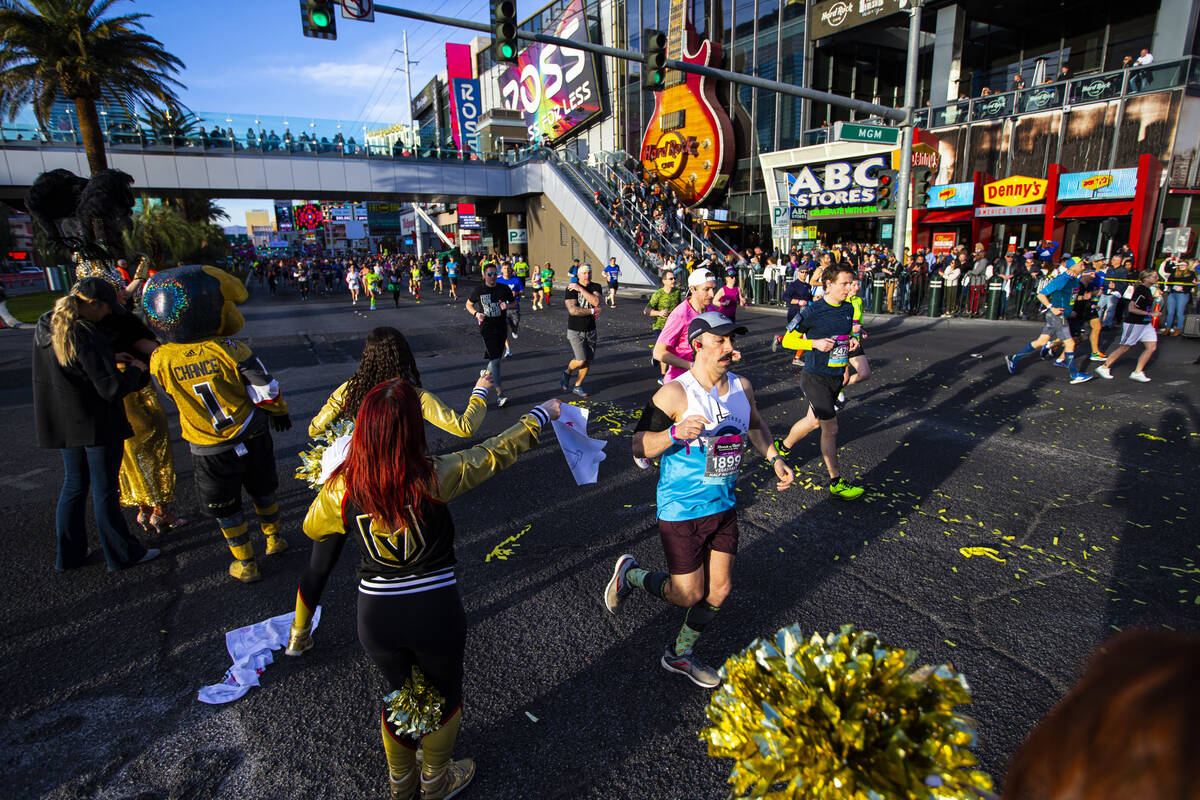 Members of the Vegas Golden Knights cast cheer on the crowd during the Rock ‘n’ R ...