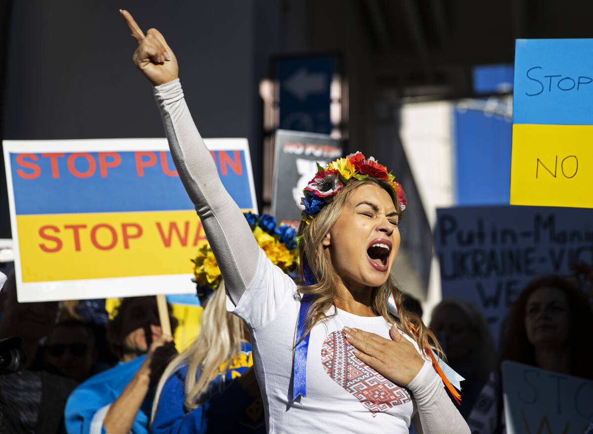 Jenny Arata, from Kyiv, Ukraine, leads demonstrators during a protest over the Russian invasion ...