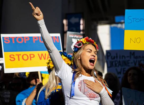 Jenny Arata, from Kyiv, Ukraine, leads demonstrators during a protest over the Russian invasion ...