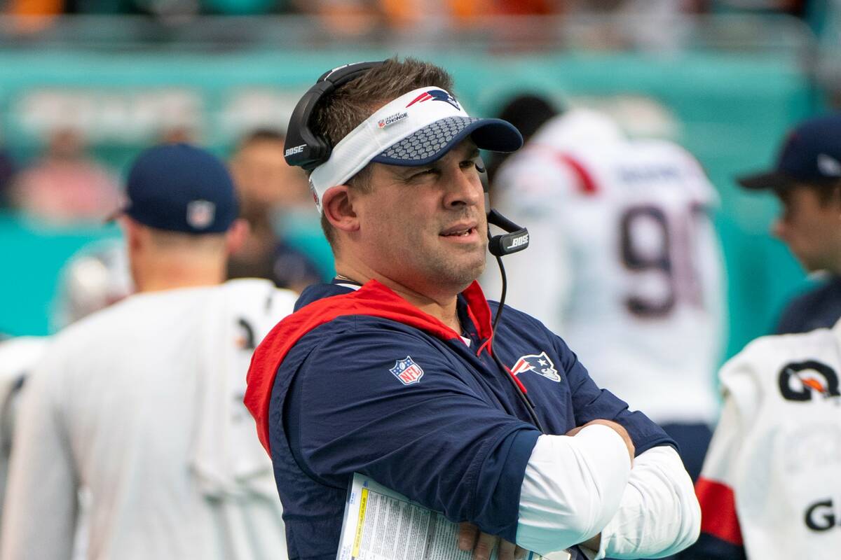 New England Patriots offensive coordinator and quarterbacks coach Josh McDaniels watches from t ...