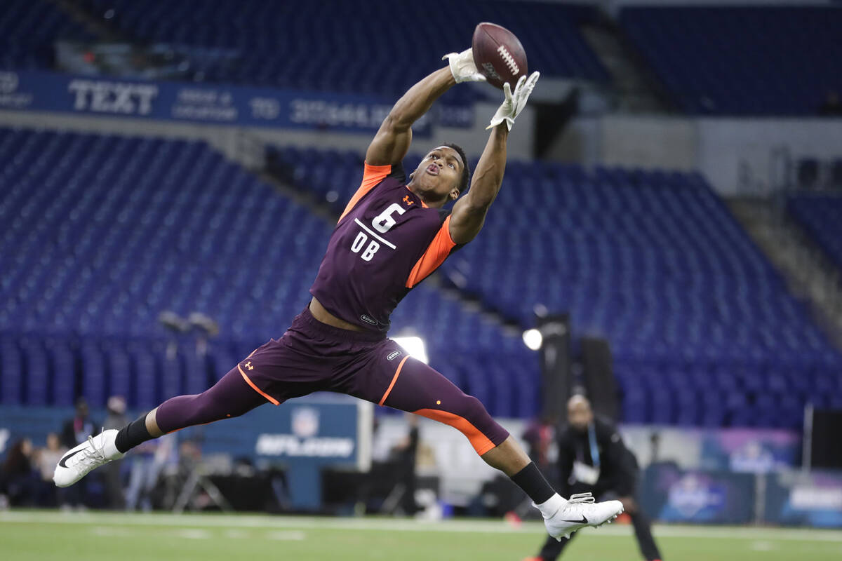 FILE - Troy defensive back Blace Brown runs a drill at the NFL football scouting combine in Ind ...