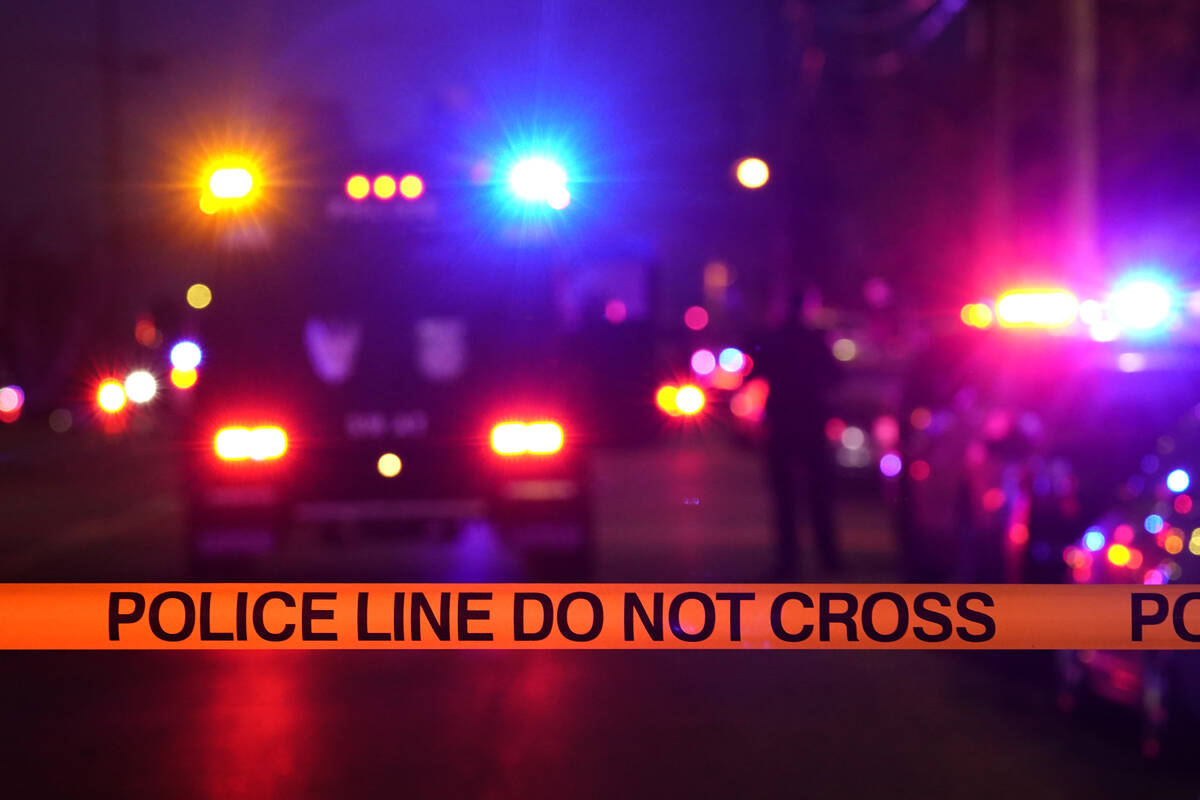 Police tape blocks the street near the scene of a shooting in Sacramento, Calif., Monday, Feb. ...