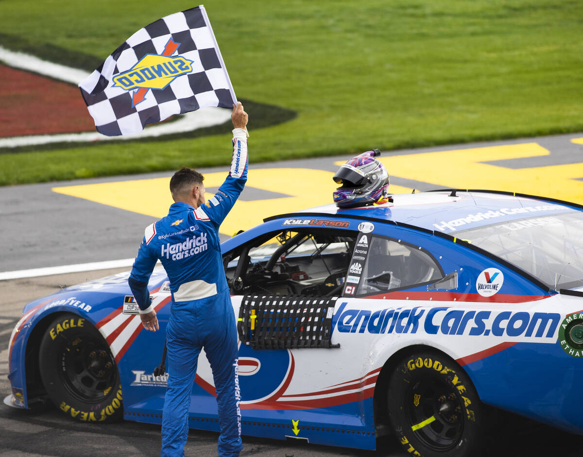 NASCAR Cup Series driver Kyle Larson (5) celebrates after winning the NASCAR Cup Series Pennzoi ...