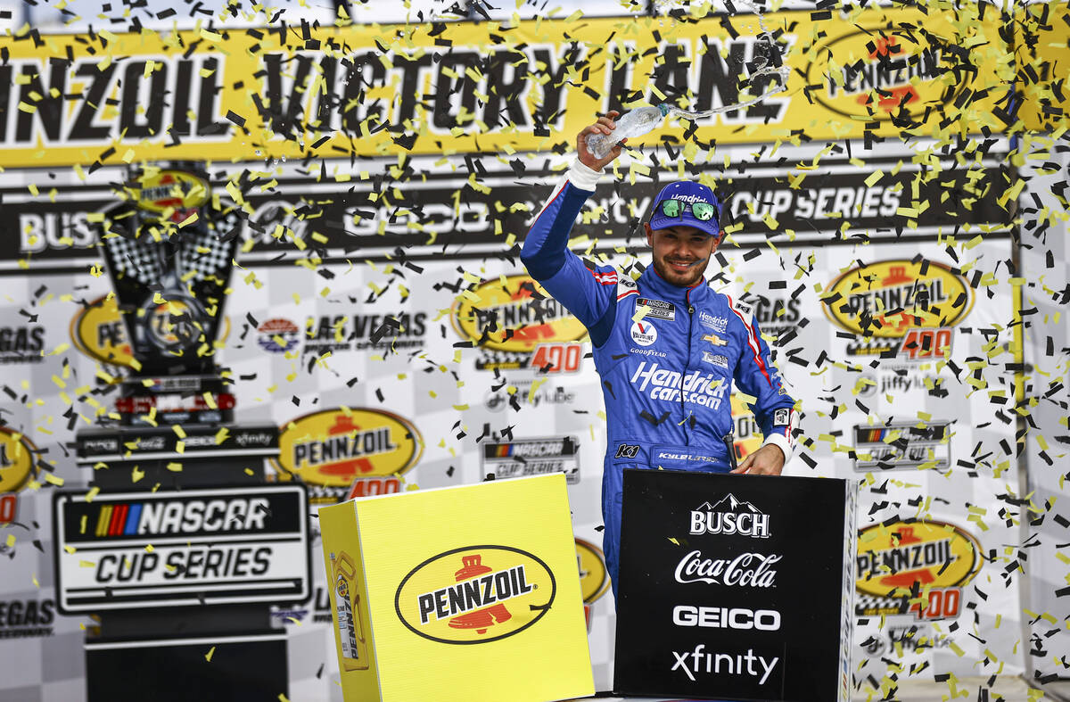 Kyle Larson celebrates after winning the NASCAR Cup Series Pennzoil 400 auto race at the Las Ve ...