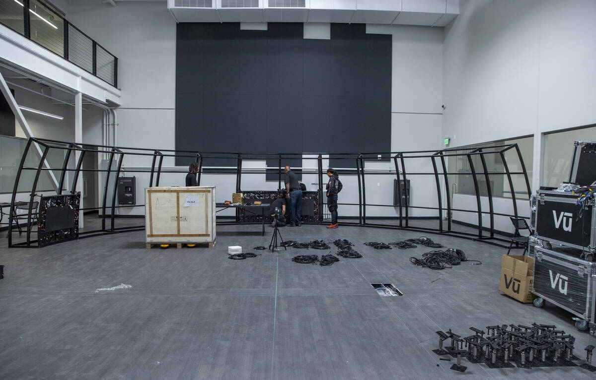 A crew continues to build a video dome in one of three studios during a tour of Vū Studios' ne ...