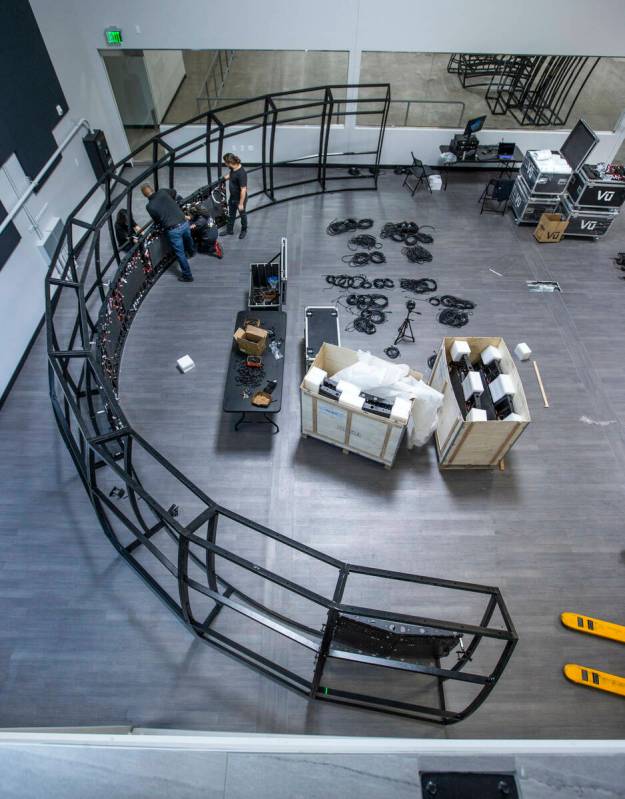 A crew continues to build a video dome in one of three studios during a tour of Vū Studios' ne ...