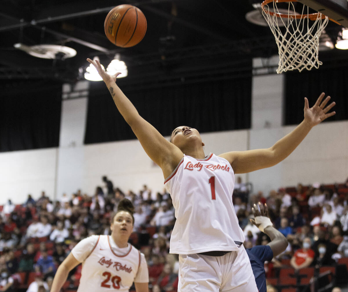 UNLV Lady Rebels forward Nneka Obiazor (1) grabs a rebound in the second half during a girls co ...