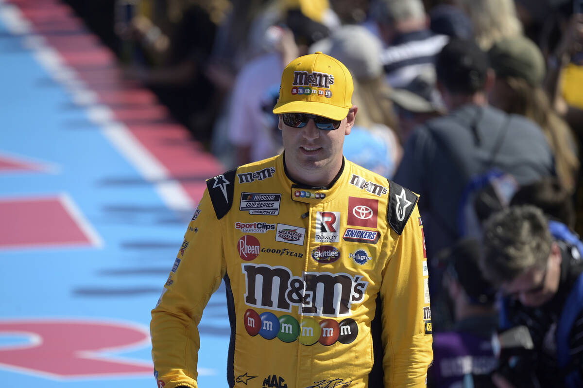 Kyle Busch walks down the stage during driver introductions before the NASCAR Daytona 500 auto ...