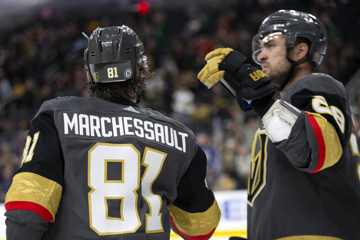 Golden Knights center Jonathan Marchessault (81) is congratulated by left wing William Carrier ...