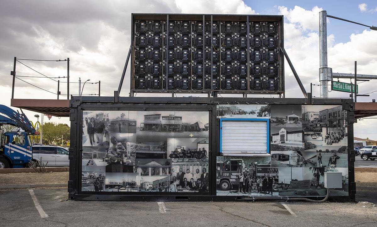 A montage of the Historical Westside sits in the parking lot of Mario's Westside Market with a ...