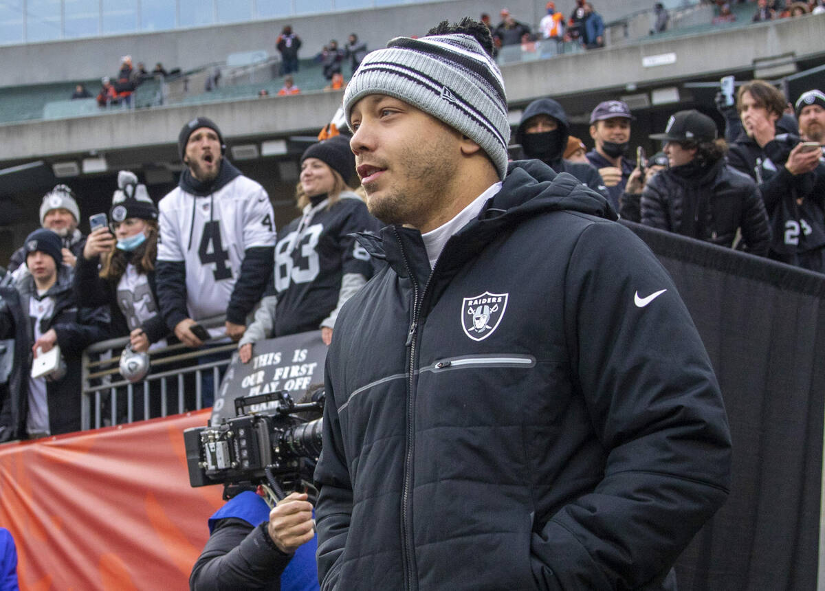 Raiders fullback Alec Ingold walks out with the team before an NFL playoff game between the Rai ...