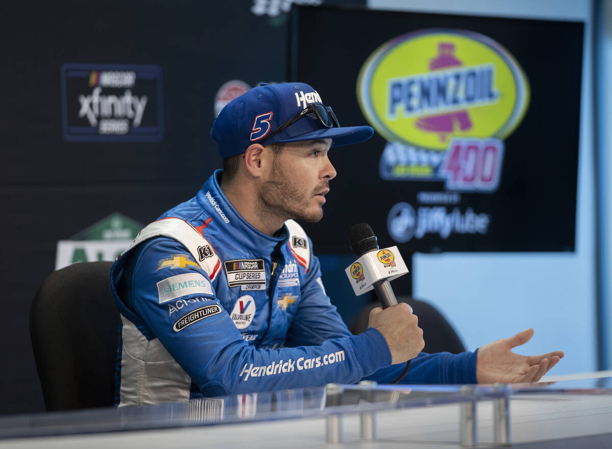 Cup Series driver Kyle Larson (5) speaks to the media after qualifying for the Pennzoil 400 on ...