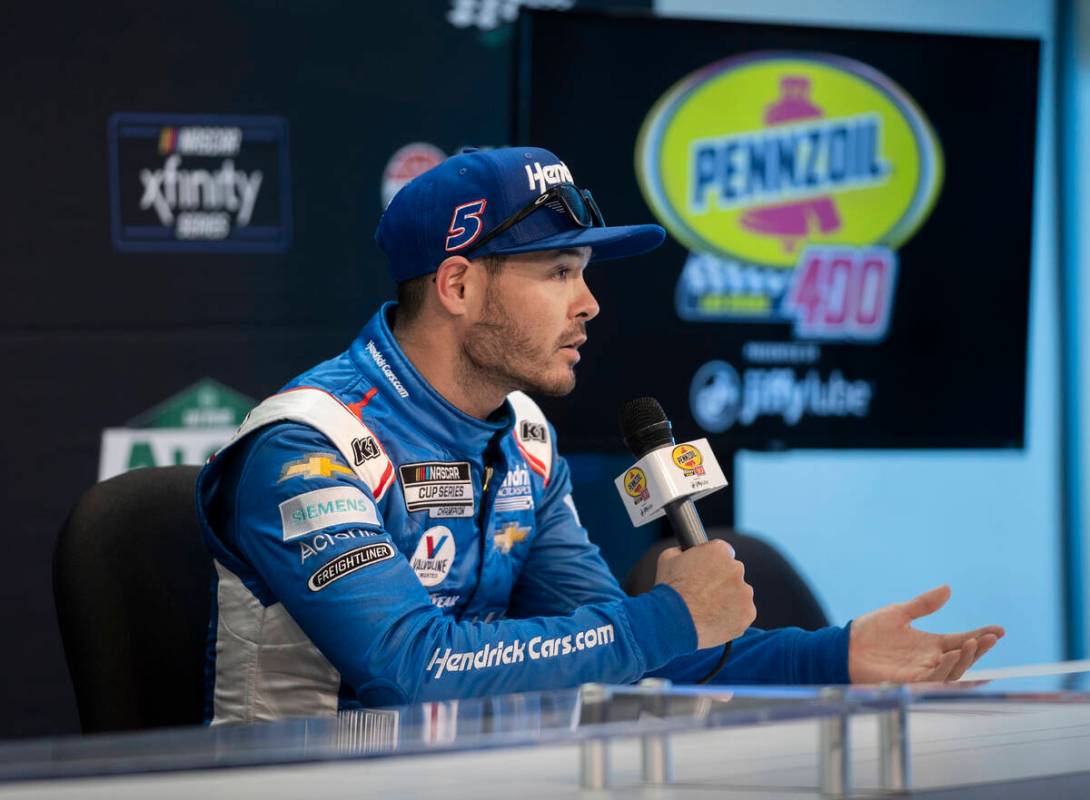 Cup Series driver Kyle Larson (5) speaks to the media after qualifying for the Pennzoil 400 on ...