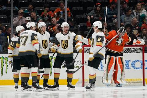 The Vegas Golden Knights celebrate after center Jonathan Marchessault (81) scored during the se ...