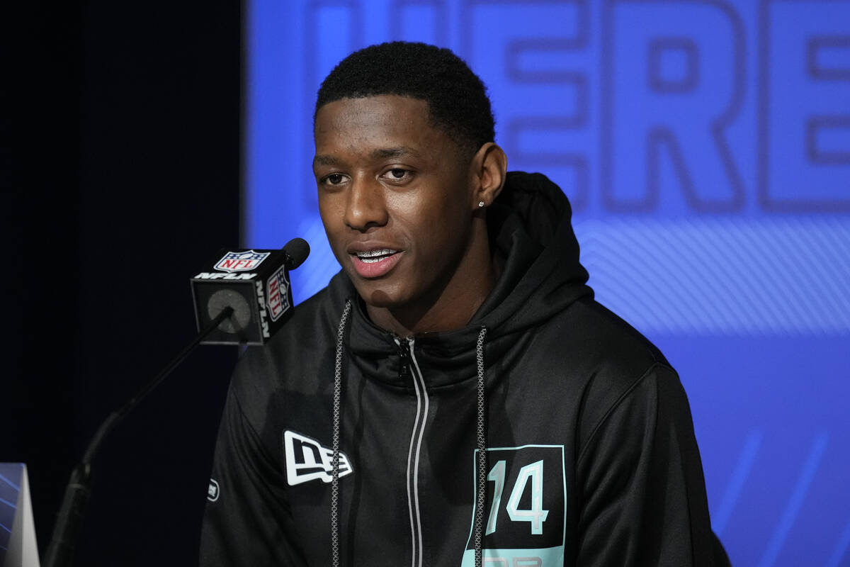 Cincinnati defensive back Sauce Gardner speaks during a press conference at the NFL football sc ...