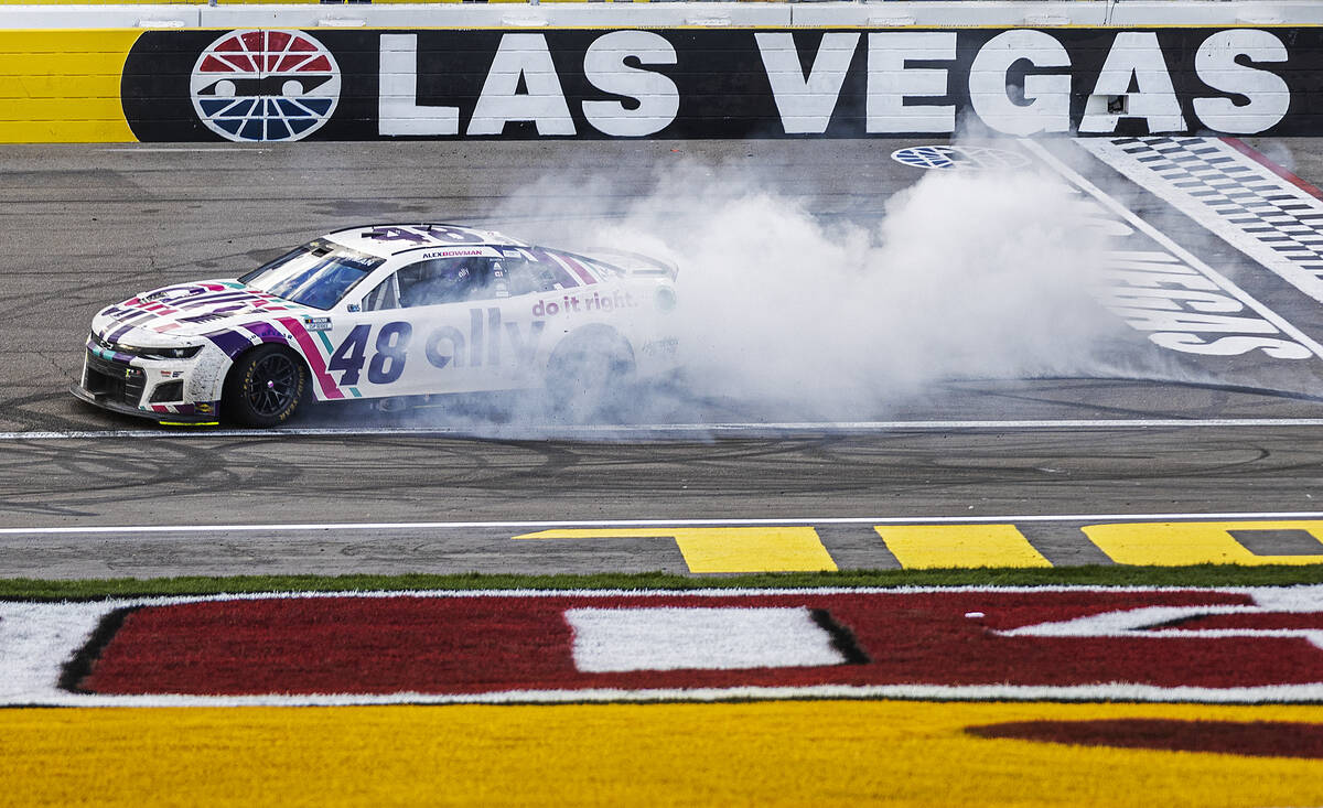 NASCAR Cup Series driver Alex Bowman (48) celebrates with a burn out after winning the Pennzoil ...