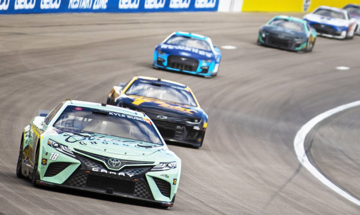 NASCAR Cup Series driver Kyle Busch (18) competes in the Pennzoil 400 NASCAR Cup Series race on ...