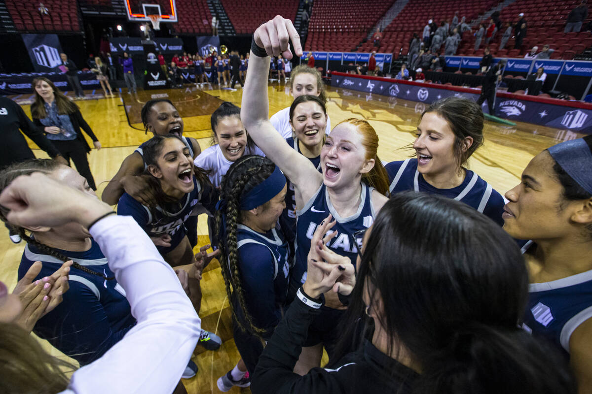 The Utah State Aggies celebrate after defeating the Fresno State Bulldogs in a Mountain West to ...
