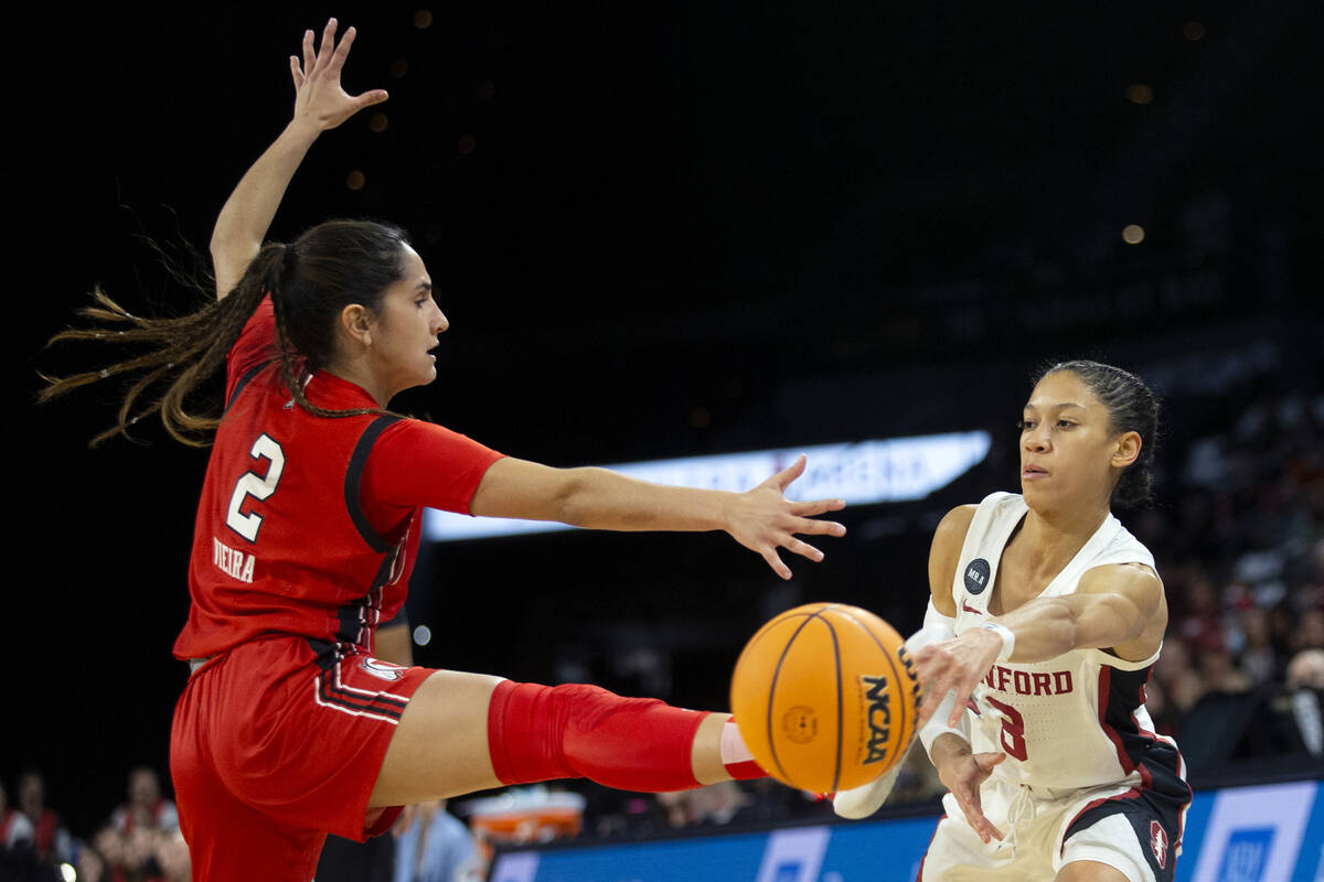 Stanford guard Anna Wilson (3) passes around Utah guard Ines Vieira (2) during the second half ...