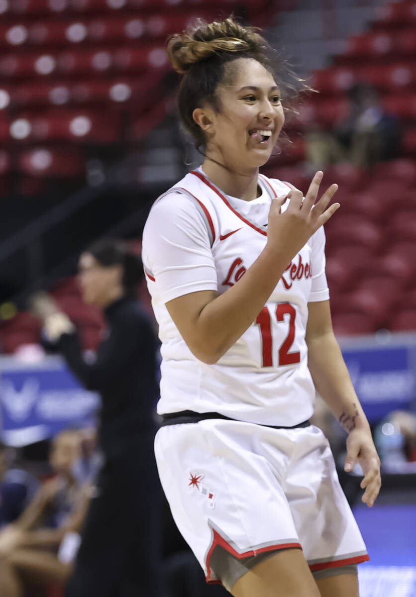 UNLV Lady Rebels guard Alyssa Durazo-Frescas (12) celebrates after scoring against the Utah Sta ...