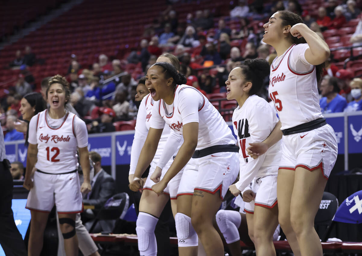 UNLV Lady Rebels players celebrate after a play by UNLV Lady Rebels forward Nneka Obiazor, not ...