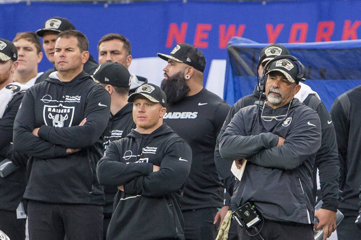 Raiders coaches, from left, A.J. Neibel, Deuce Gruden and Rich Bisaccia during the fourth quart ...