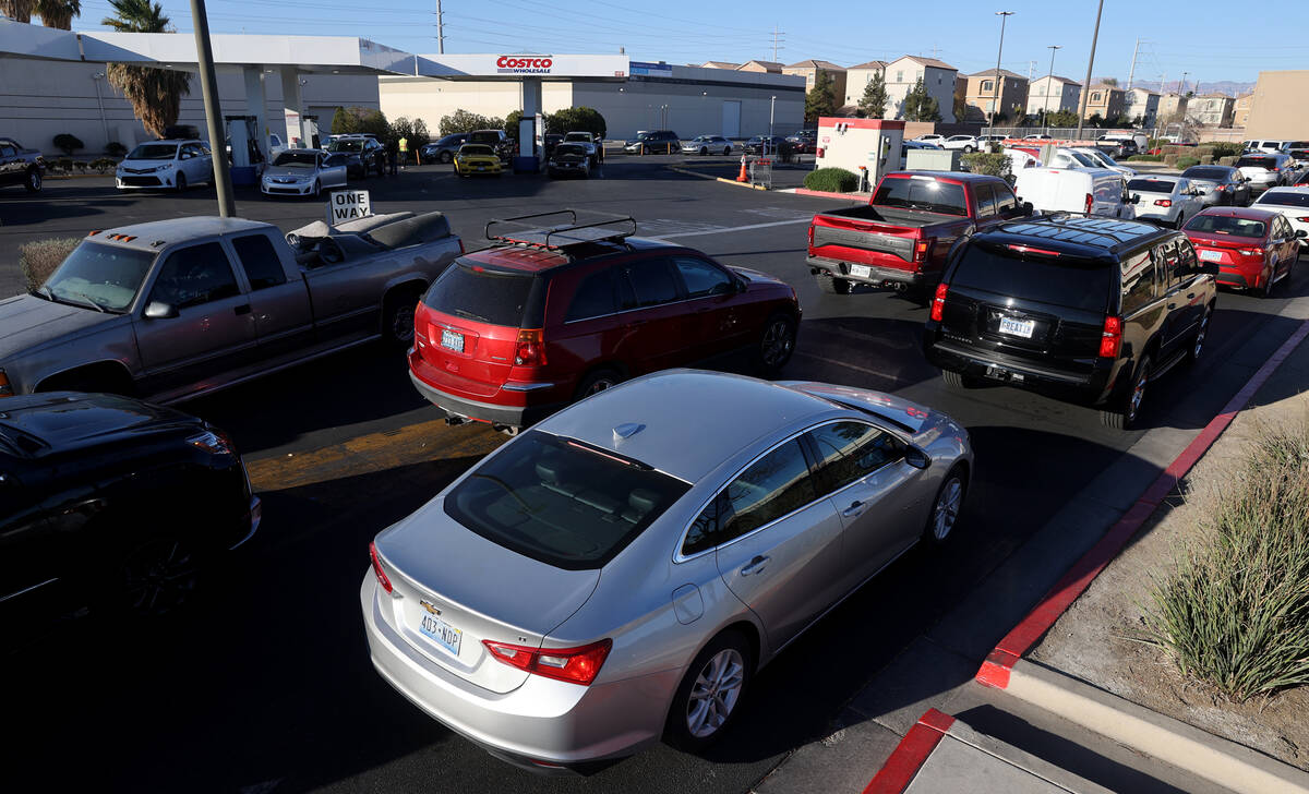 People line up for gas as Costco Business Center on Martin Luther King Boulevard in Las Vegas M ...