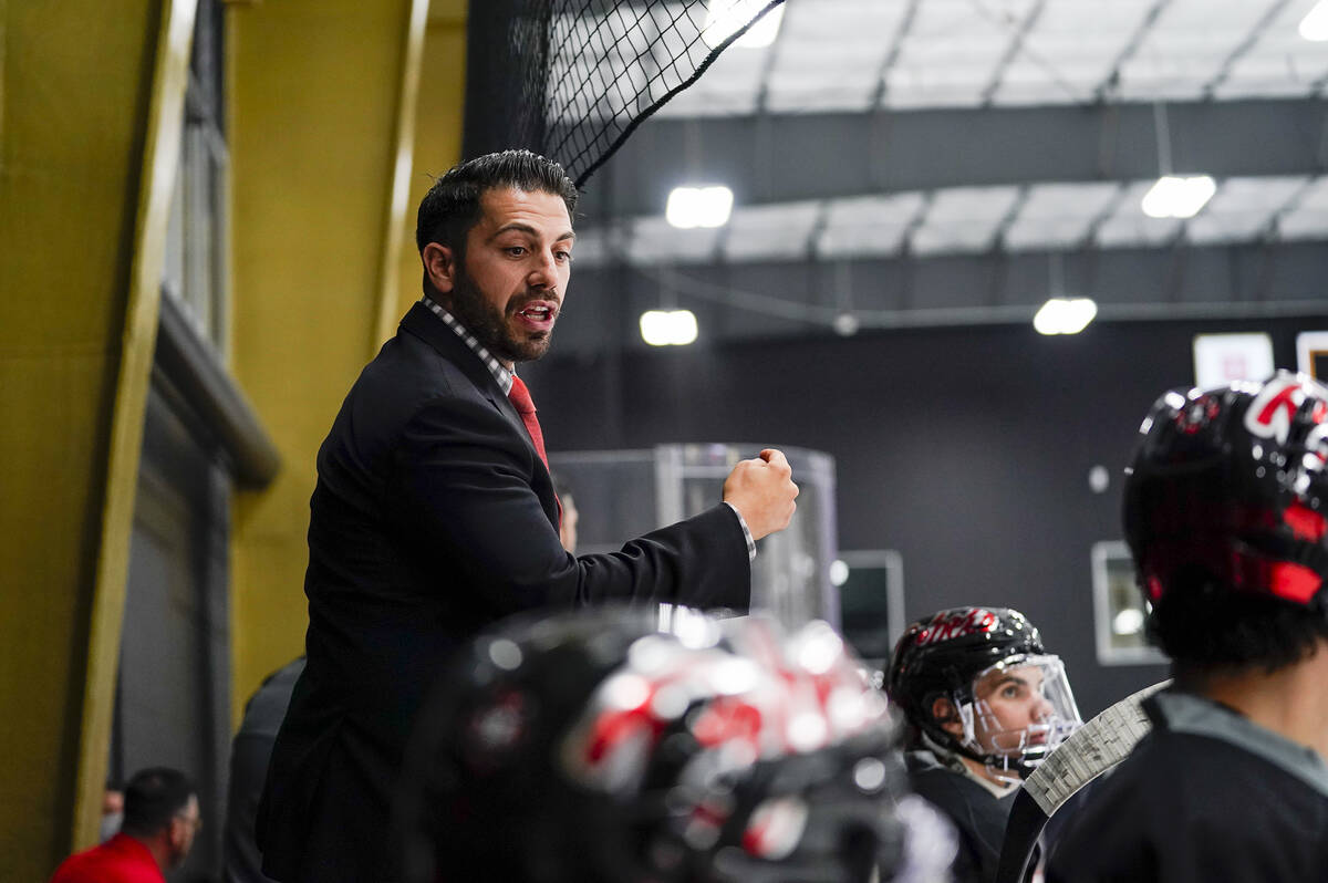 UNLV hockey head coach Anthony Vignieri Greener gives his instructions to his team during a gam ...