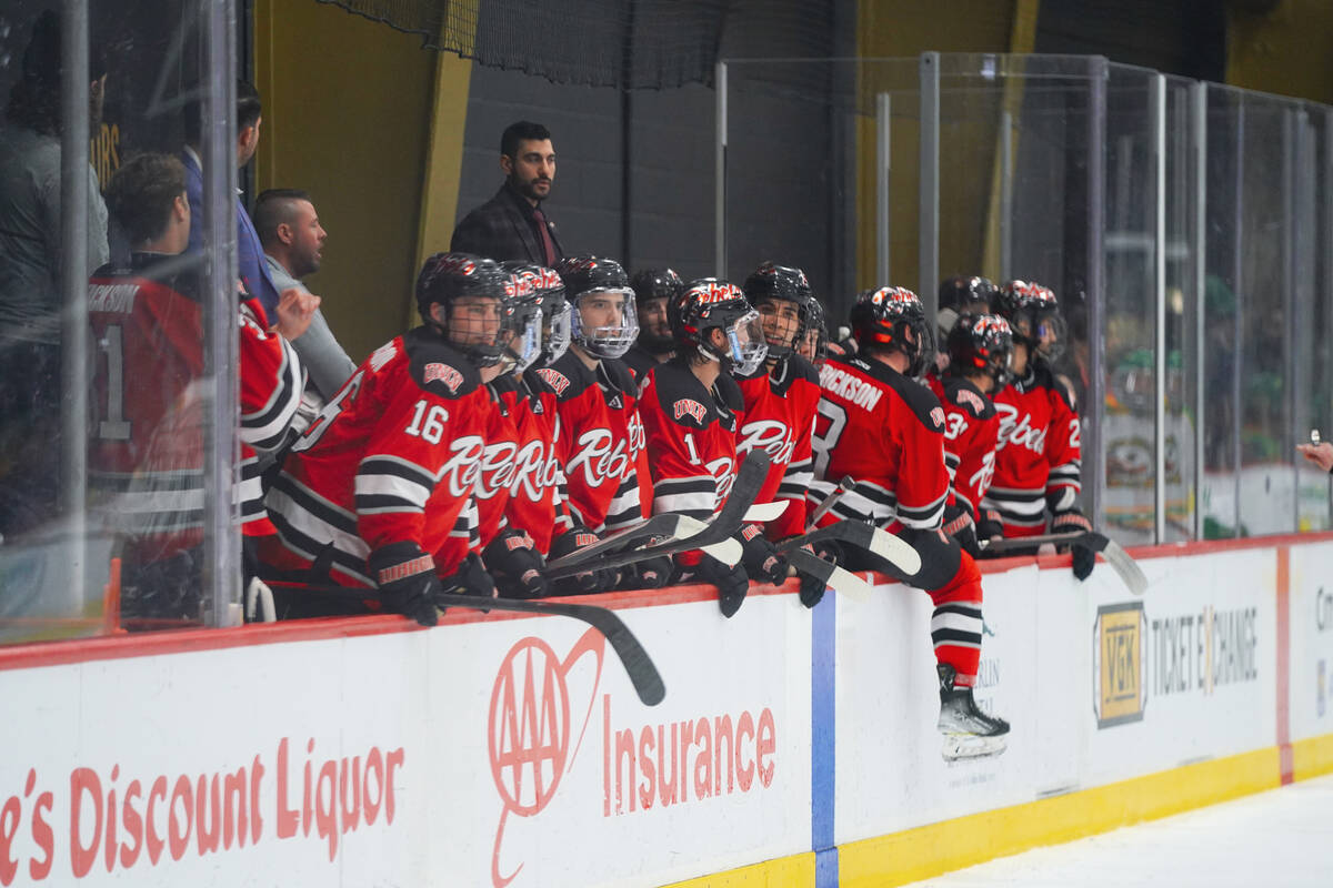 The UNLV hockey team looks on from the bench during a home game at City National Arena. (Lucas ...