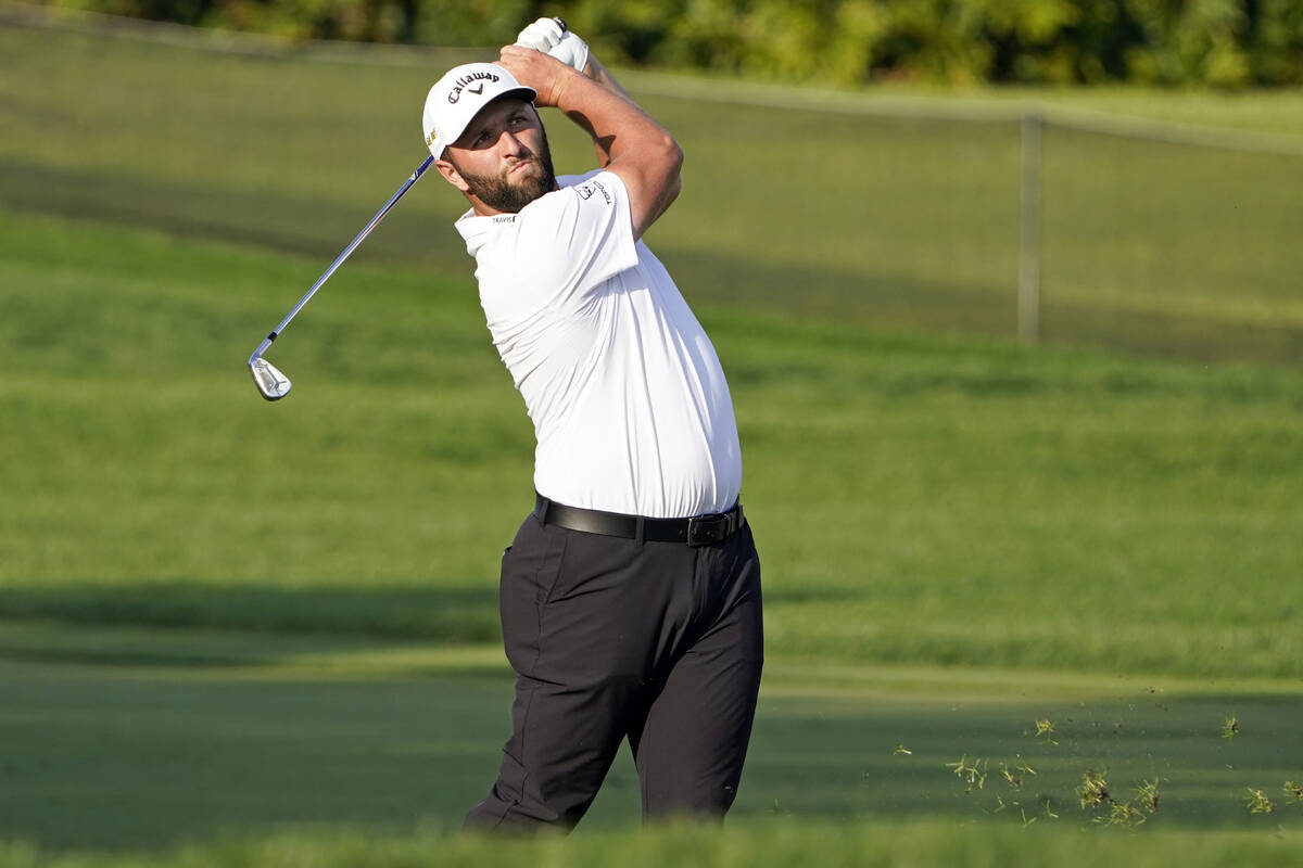 Jon Rahm, of Spain, hits a shot from the 16th fairway during the first round of the Arnold Palm ...