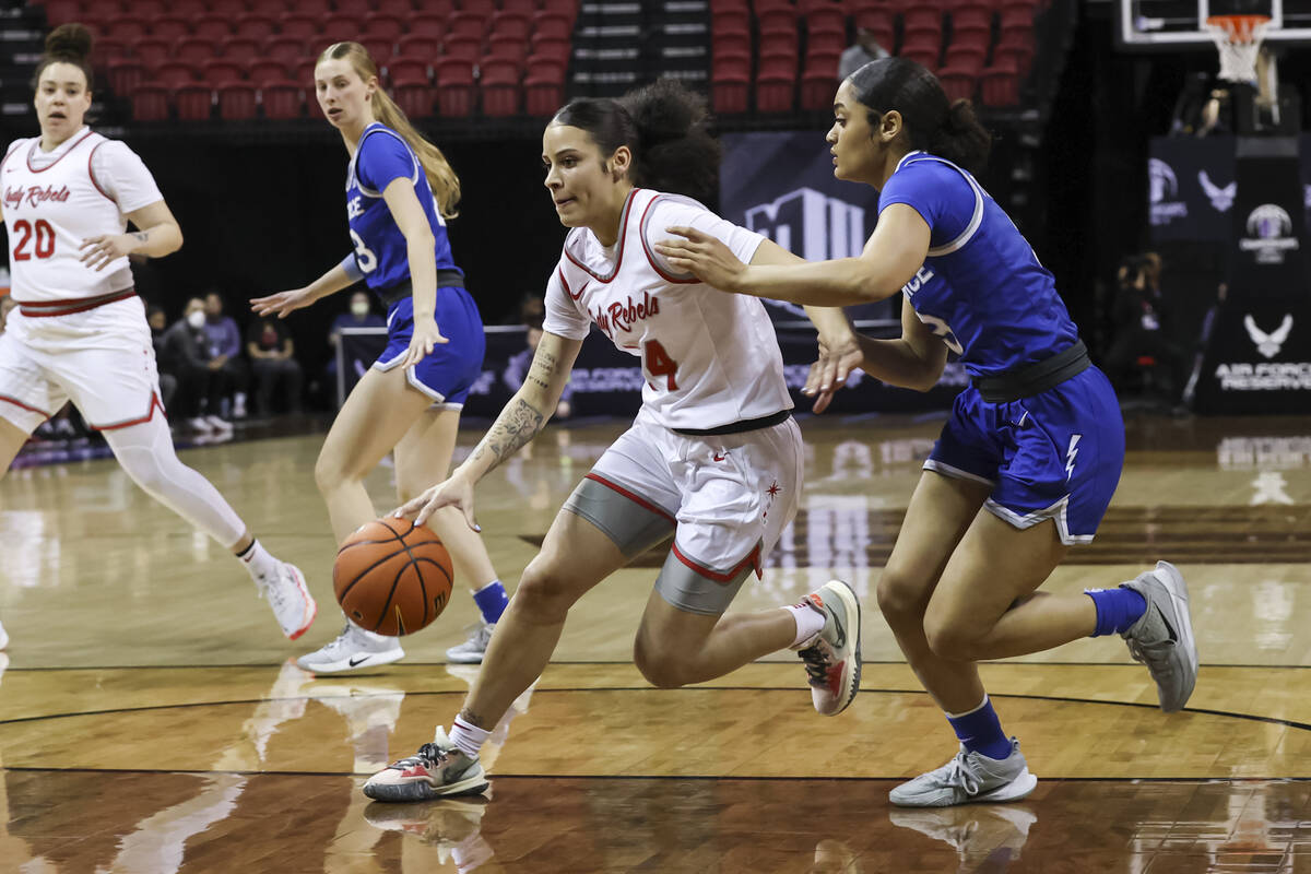 UNLV Lady Rebels guard Essence Booker (24) drives to the basket against Air Force Falcons guard ...