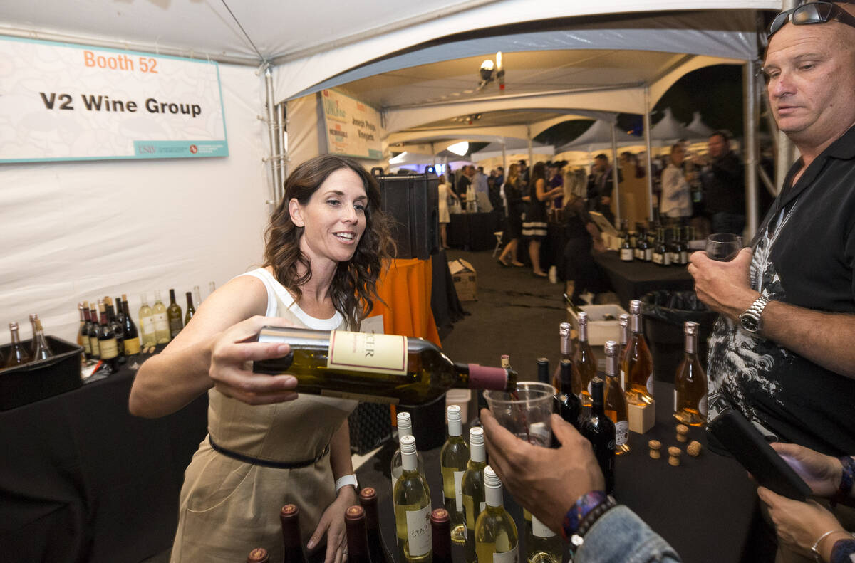 Guest sample wines are seen at the V2 Wine Group booth during the UNLVino fundraiser in Las Veg ...