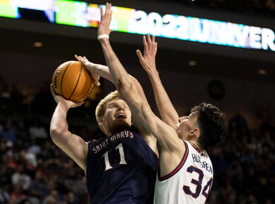 St. Mary's Gaels forward Matthias Tass (11) shoots over Gonzaga Bulldogs center Chet Holmgren ( ...