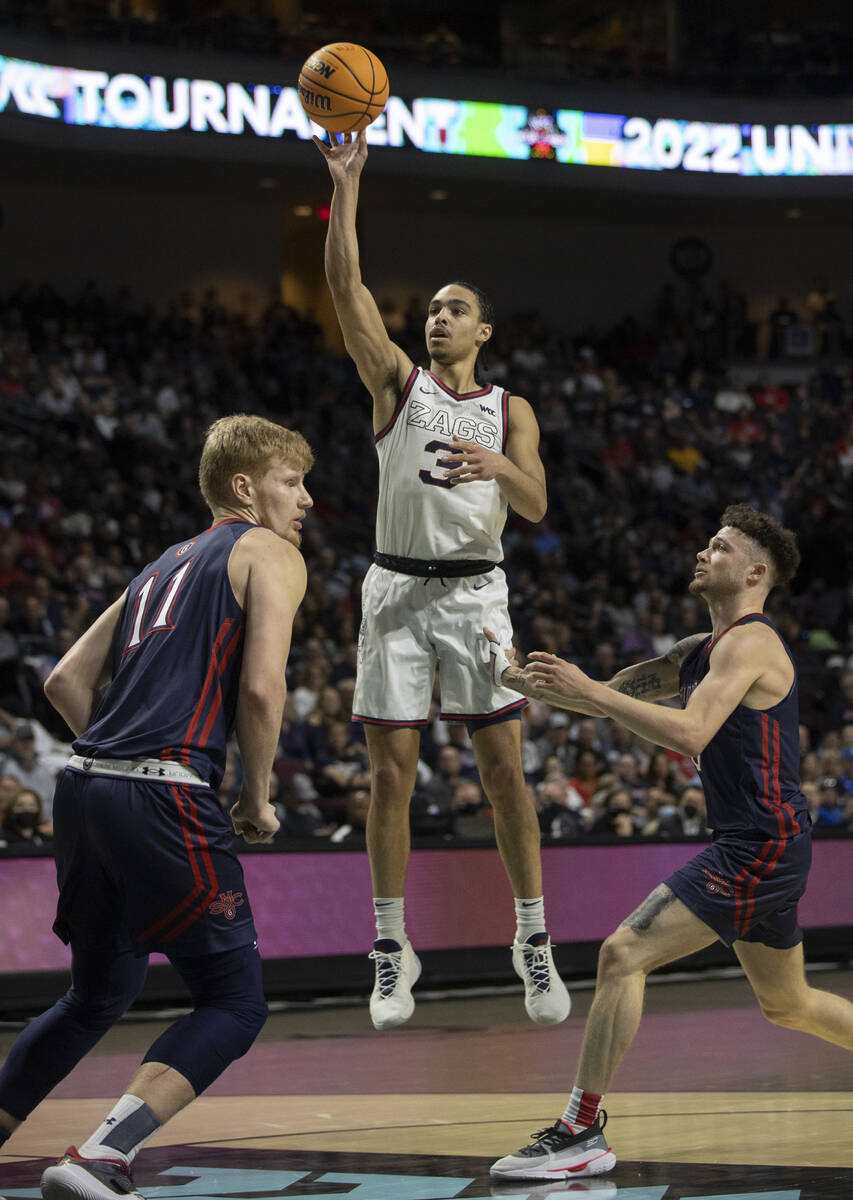 Gonzaga Bulldogs guard Andrew Nembhard (3) shoots a floater over St. Mary's Gaels forward Matth ...