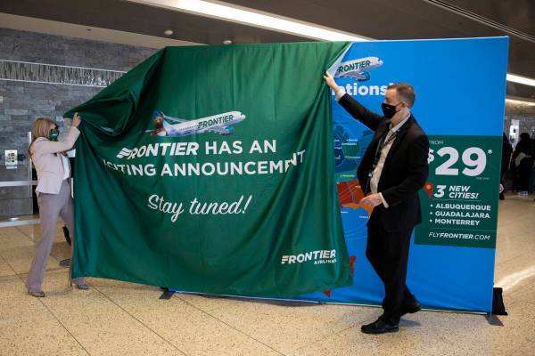 Frontier Airlines Vice President of Marketing Tyri Squyres, left, and Harry Reid International ...