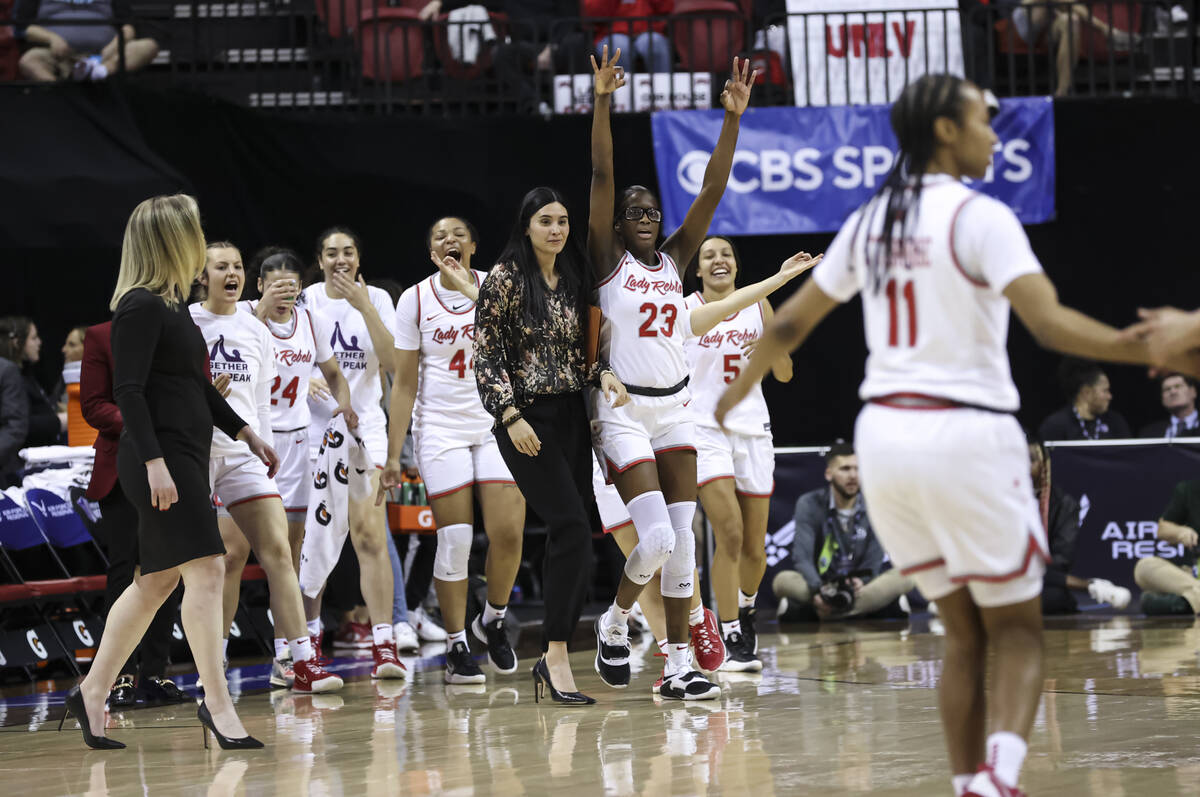 The UNLV Lady Rebels celebrate during the first half of the Mountain West tournament championsh ...